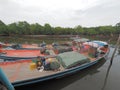 Thai fisherman boat in the river before out to the sea Royalty Free Stock Photo