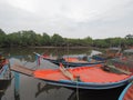 Thai fisherman boat in the river before out to the sea Royalty Free Stock Photo