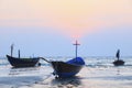 Thai fishery boat on sea beach against beautiful dusky sky use f