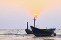 Thai fishery boat on sea beach against beautiful dusky sky use f