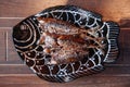 Thai food on dinner table, deep fried crispy makerel fish on beautiful plate Royalty Free Stock Photo