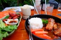 Thai Food .Fried Chicken with Spicy Sauce and sticky rice. Braised Pork Ribs Royalty Free Stock Photo