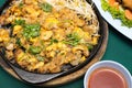 Thai food, fried mussel pancake in hot pan Royalty Free Stock Photo