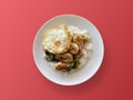 Thai food, fried rice with basil, prawns and fried eggs on white plate Royalty Free Stock Photo