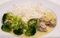 Thai food - Homemade : Green curry pork meat balls with broccoli served with jasmine rice on white plate Royalty Free Stock Photo
