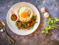 Thai Food Jusmine Rice topped with egg and stir-fried beef and basil, famous street food in Thailand, fast food,