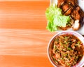 Thai food (KAIYANG-SOMTUM) : Panaya spicy salad with salted crab and Grilled chicken and sticky rice Royalty Free Stock Photo