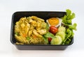 Thai food lunch box in plastic packages, Authentic Thai green curry chicken fried rice Royalty Free Stock Photo