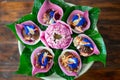 Thai Food-Miang Kham Petal of Lotus Flower Wraps with sauce Thai ancient dish