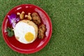 Thai food name is American Fried Rice served with fried egg and fried chicken. Royalty Free Stock Photo