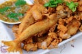 Thai food name is Deep fried Silver banded fish with garlic pepper