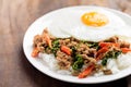 Thai food Pad Kaprao Moo Kai Dao, Stir-fried basil with minced pork Royalty Free Stock Photo