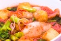 Thai food.Pink seafood flat noodles.Spicy lemongrass flavored so Royalty Free Stock Photo