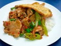 thai food, rice topped with stir-fried beef