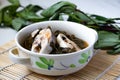 Thai food, Sour Soup (Gaeng Som Pla) Okra leaves in white cups