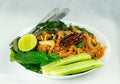 Thai food spicy flavored local salad with lemon & fresh vegetable isolated on white background. Thai food close - up photography.