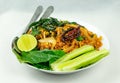 Thai food spicy flavored local salad with lemon & fresh vegetable isolated on white background. Thai food close - up photography.