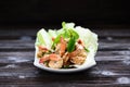 Thai food - spicy Shrimp salad with garlic and basil Royalty Free Stock Photo