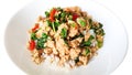 Thai food: Stir-fried chicken with red chilies and basil leaves in ceramic plate isolated on white background 506