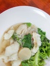 Thai Food Style:A Fish Noodle Soup Served With Meatballs.