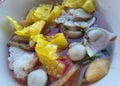 thai food style, noodle with shrimp, squid, lemon on dish background, healthy eating