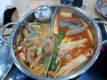 Thai food style, Top view of double flavor hot pot with shrimp and vegetable. Royalty Free Stock Photo