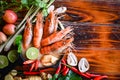 Thai Food Tom Yum Kung, Hot and sour spicy shrimps prawns soup curry lemon lime galangal red chili straw mushroom on table food, Royalty Free Stock Photo