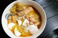 Thai Food - Tomyam with seafood and eggs Royalty Free Stock Photo