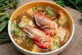 Acacia omelets and fresh shrimp in vegetable sour soup - thai food