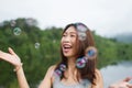 Thai girl enjoy with air bubbles Royalty Free Stock Photo