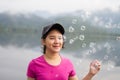 Thai girl enjoy her lifestlye and happy with air bubbles Royalty Free Stock Photo