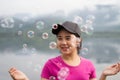 Thai girl enjoy her lifestlye and happy with air bubbles Royalty Free Stock Photo