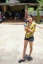 Thai girl holding water gun on Songkran`s day Royalty Free Stock Photo