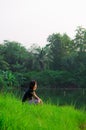 Thai girl is letting her mind flow Royalty Free Stock Photo