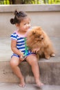 thai girl with pomeranian