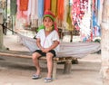 Thai girl sitting on the bench Royalty Free Stock Photo