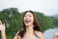 Thai girl smile and happy with air bubbles Royalty Free Stock Photo