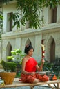 Thai girl in traditional dress in playing Thai fiddle.