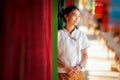 Thai girl in traditional lanna costume travel in lamduan woven cloth