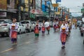 Thai girls hold an offering and paraded around Chiang Rai town. Royalty Free Stock Photo