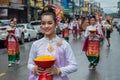 Thai girls hold an offering and paraded around Chiang Rai town. Royalty Free Stock Photo