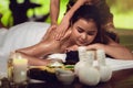 Thai girls therapist body spa massage and lying relaxation in business massaging and salon shop., Pretty attractive asian woman is