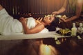 Thai girls therapist body spa massage and lying relaxation in business massaging and salon shop., Pretty attractive asian woman is