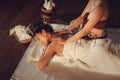 Thai girls therapist body spa massage and lying relaxation in business massaging and salon shop., Pretty attractive asian woman is