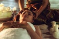 Thai girls therapist body spa massage and lying relaxation in business massaging and salon shop., Pretty attractive asian woman is