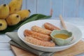 Thai grilled bananas serve with honey or coconut syrub. Royalty Free Stock Photo