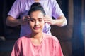 Thai Head massage to Asian woman Royalty Free Stock Photo