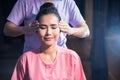 Thai head massage to Asian woman in spa salon Royalty Free Stock Photo