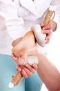 Thai herb compress massage of leg. Royalty Free Stock Photo