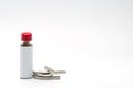 Thai herbal powder snuff in classic bottle with red cap and two snuff tube made of steel and chrome